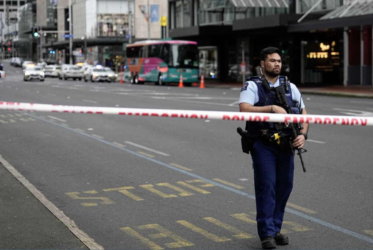 Downtown Auckland Construction Site Shocked by Gunmans Rampage: Calls for Action on Domestic Violence and Gun Control