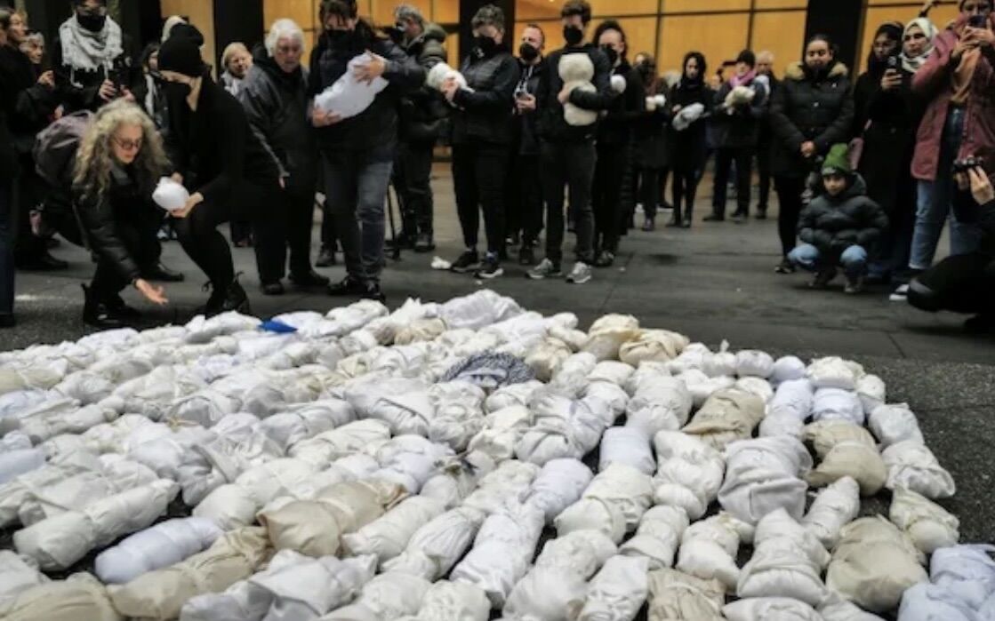 Pro-Palestinian Protesters Stage Mock Funeral in NYC to Demonstrate Against Israels Bombardment of Gaza Strip