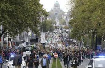 Thousands March in Brussels, Demanding Urgent Climate Action as COP28 Talks Kick Off