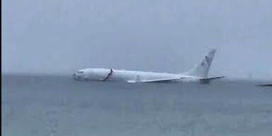 Navy Plane Overshoots Runway, Plunges into Kaneohe Bay - Miraculous Escape for All 9 Onboard!