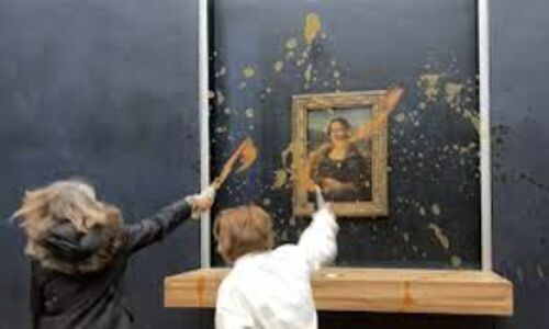 Soup-throwing activists target Mona Lisa in Paris Louvre protest Soup-throwing activists target Mona Lisa in Paris Louvre protest
