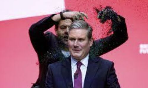 Labour Party Leader Keir Starmer Interrupted by Protester in Glittering Display of Democracy Demands Labour Party Leader Keir Starmer Interrupted by Protester in Glittering Display of Democracy Demands