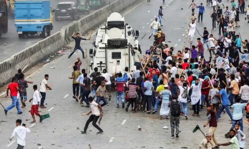 Bangladesh Police Clash with Opposition Supporters Demanding Prime Ministers Resignation over Economic Crisis and Rights Abuses