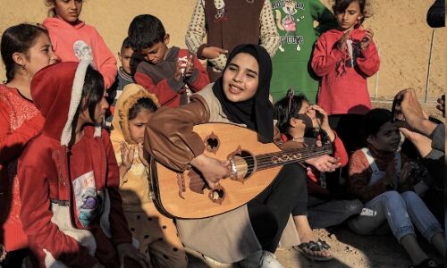 Volunteer Entertainer Offers Glimmer of Relief to Displaced Palestinian Children Amid Israeli Bombardment Volunteer Entertainer Offers Glimmer of Relief to Displaced Palestinian Children Amid Israeli Bombardment