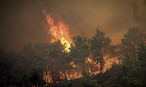 Massive Wildfires Ravage Greek Island of Rhodes, Forcing Largest Evacuation in Countrys History