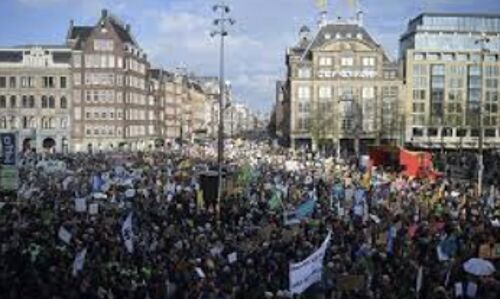Thousands Rally in Amsterdam as Largest Climate Protest Sweeps Netherlands Ahead of Election
