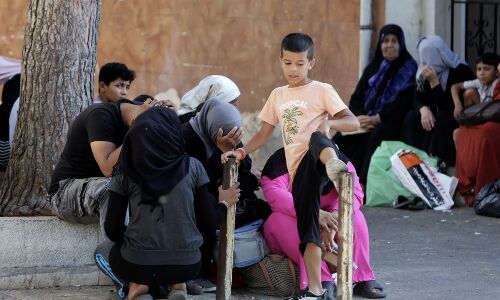 UN Takes Stand Against Armed Fighters, Suspends Services in Largest Palestinian Refugee Camp as Clashes Erupt