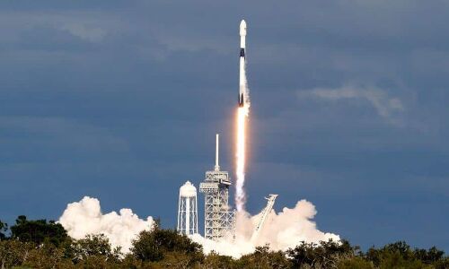 Musk’s SpaceX launches more than 60 small satellites into orbit